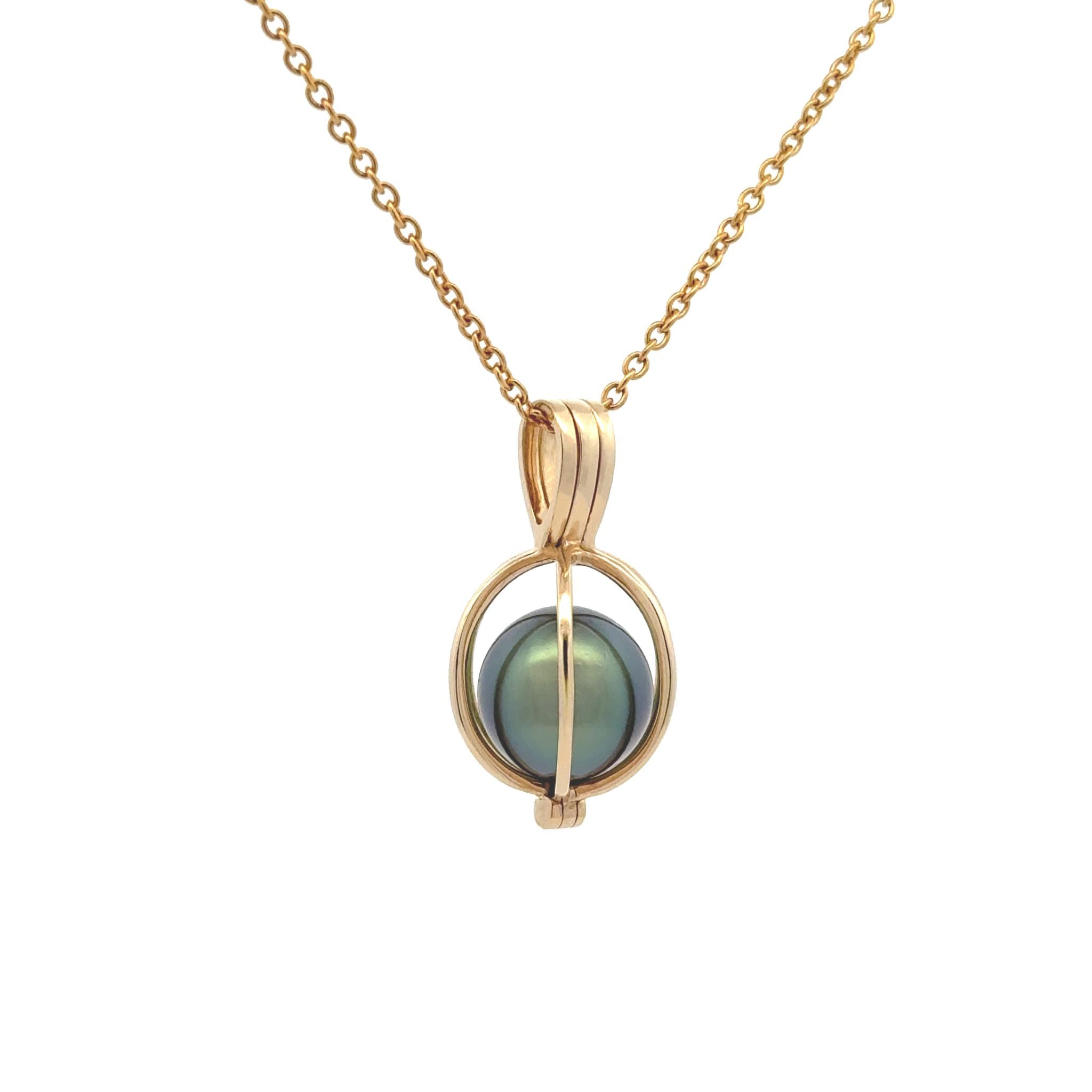 The cage design is both elegant and functional, holding the pearl securely while allowing its excellent lustre to shine through the open framework. This Willie Creek Pearls pendant is composed of 9K yellow gold, with a single 10-11mm round, black pearl with excellent lustre. Chain sold separately.