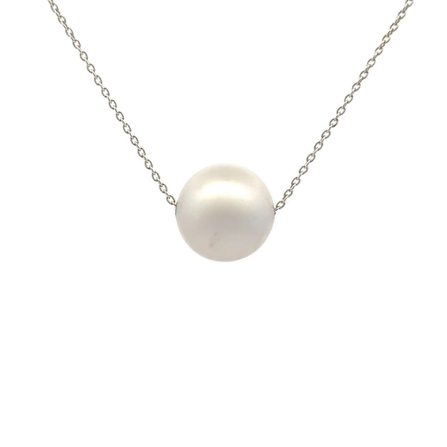 A sterling silver Australian South Sea pearl necklace featuring a single pearl on a floating chain, displayed against a white background.