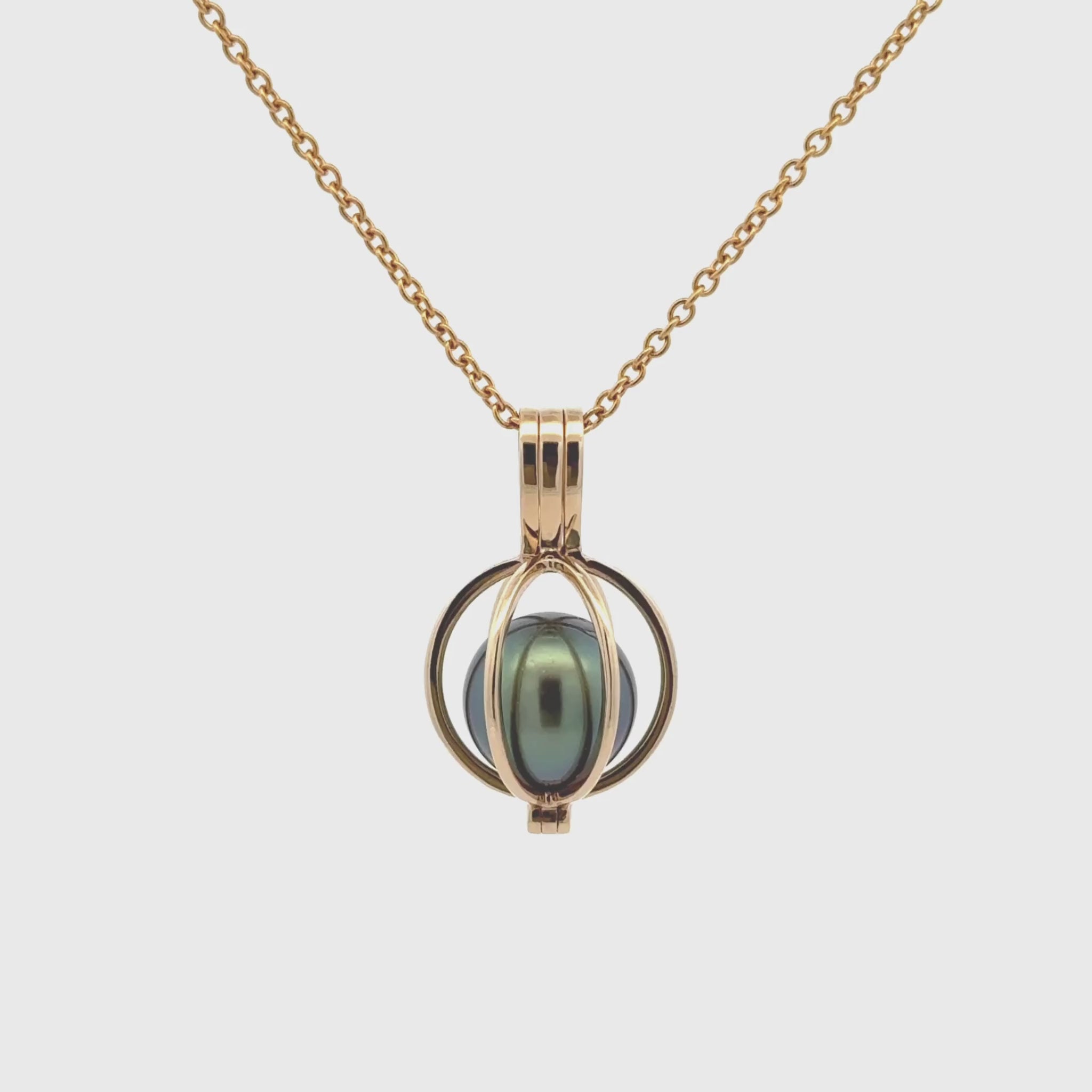 The cage design is both elegant and functional, holding the pearl securely while allowing its excellent lustre to shine through the open framework. This Willie Creek Pearls pendant is composed of 9K yellow gold, with a single 10-11mm round, black pearl with excellent lustre. Chain sold separately.